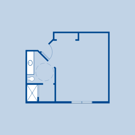 A simple architectural floor plan with a small bathroom, featuring a sink, toilet, and shower area. Walls are depicted in blue lines.