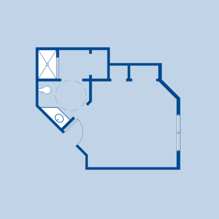 A blueprint of a small, simple bathroom layout with a shower, sink, toilet, and door, depicted on a blue background.